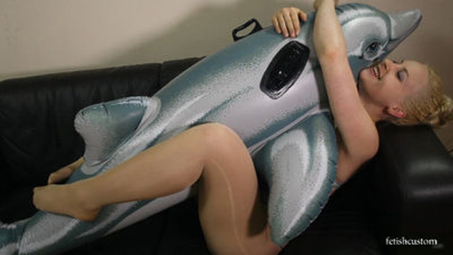 Sweet Cindy Deflating an Inflatable Dolphin