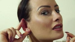 Kelli Smith Shows Her Ears and Pulls Them